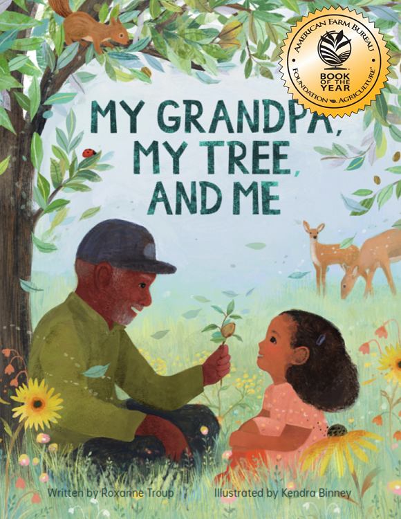 book cover for MY GRANDPA, MY TREE, AND ME shows a young girl with dark skin sitting under a pecan tree with her grandfather while forest animals look on. a gold "book of the year" seal is attached to the upper right corner